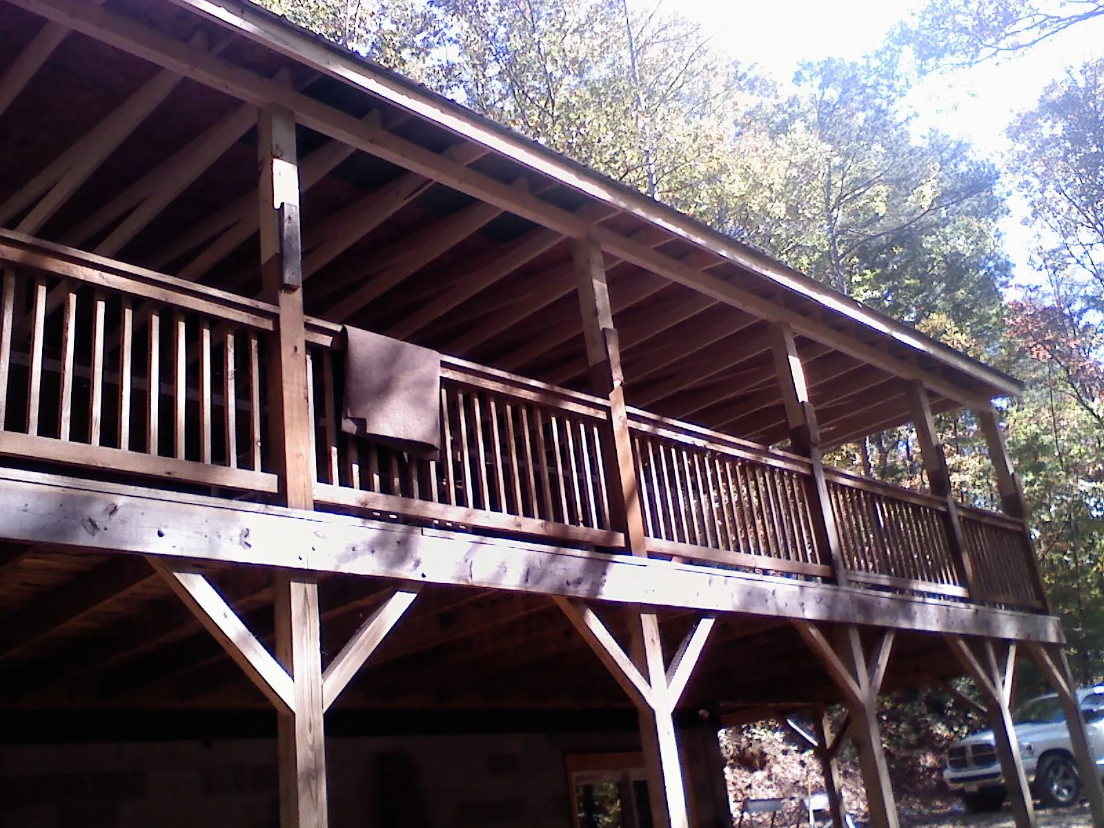 Timber framing under a new elevated porch and deck — Roof Leak Repair in Larned by Roofing Brothers